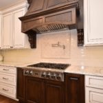 wood hood, corbels, paint glaze